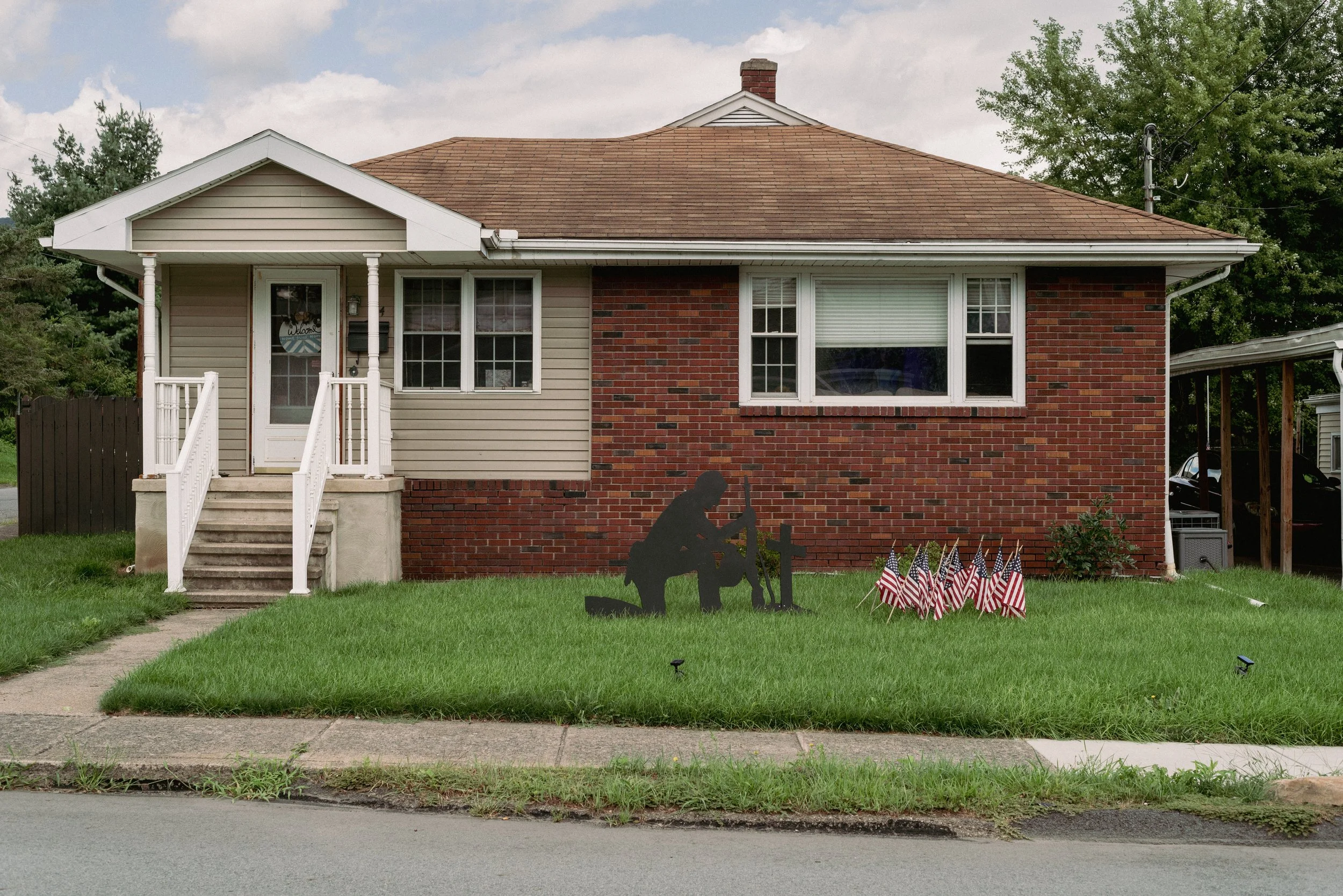 2024 Soldier And Flags On Lawn 1 - Scranton PA L.jpg