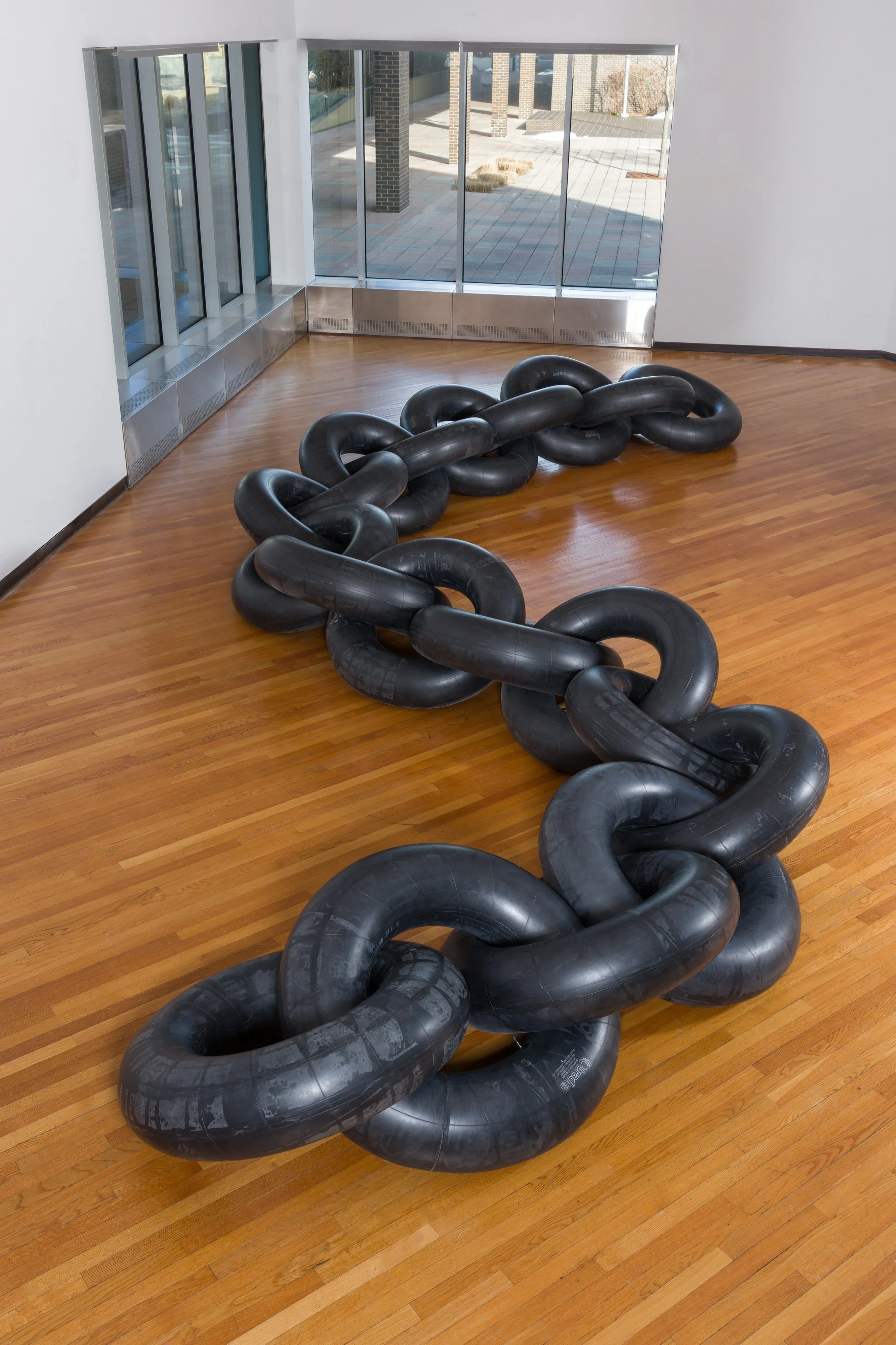  EXhAustEd,Installation view at The Richard and Dolly Maass Gallery at SUNY Purchase,  Inner tubes, 36’ x 2’ x 3’ 2025 