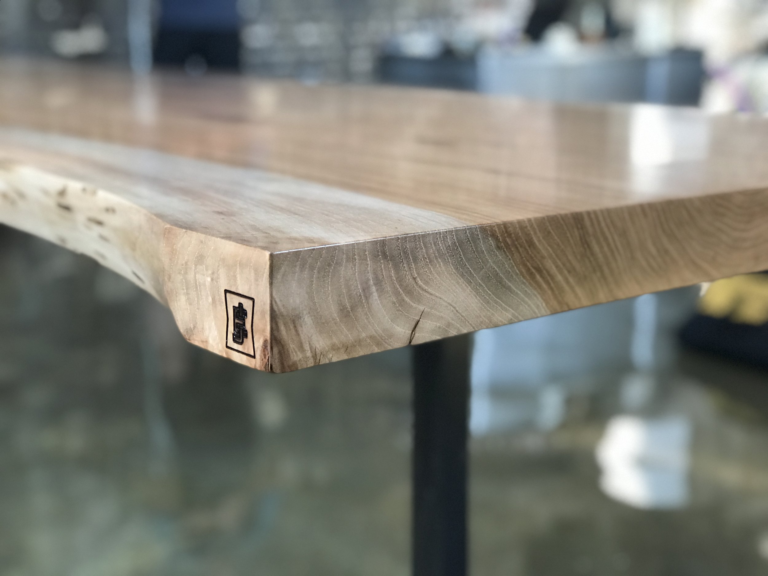 The Jack Ellis Company - Custom Pecan Live Edge Table detail