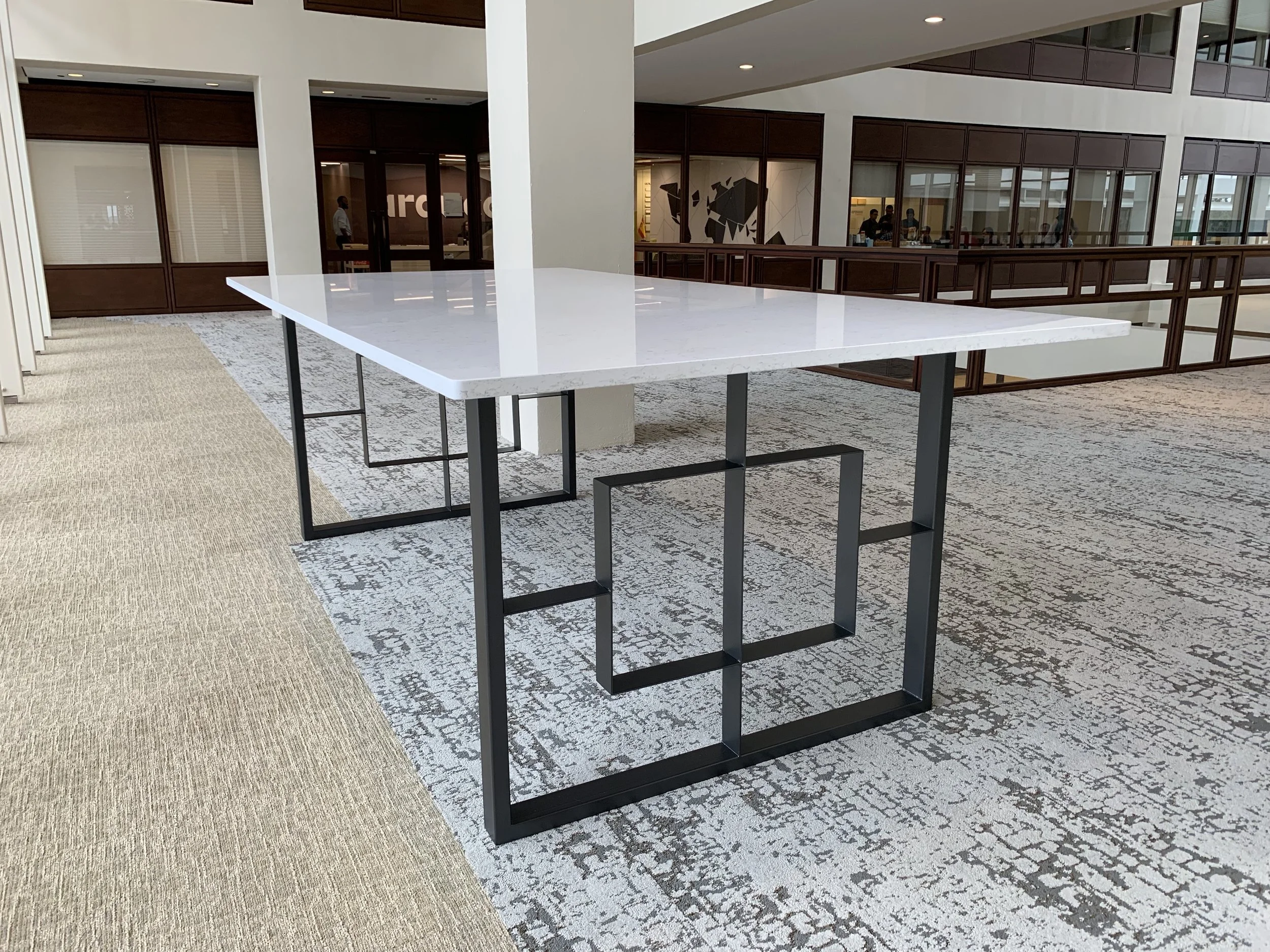 Jack Ellis Company Quartz and steel lobby table