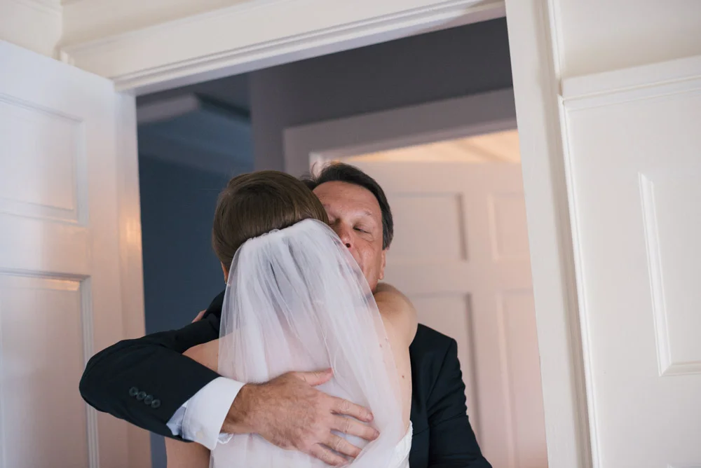 Bride Hugging Father