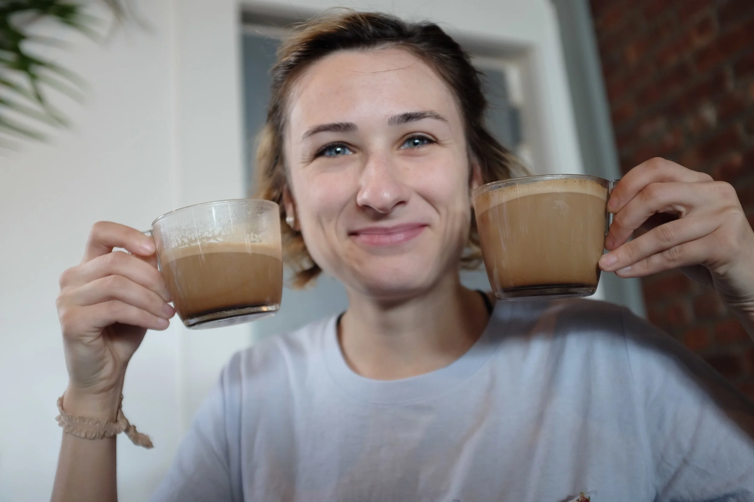 One girl, two cups.