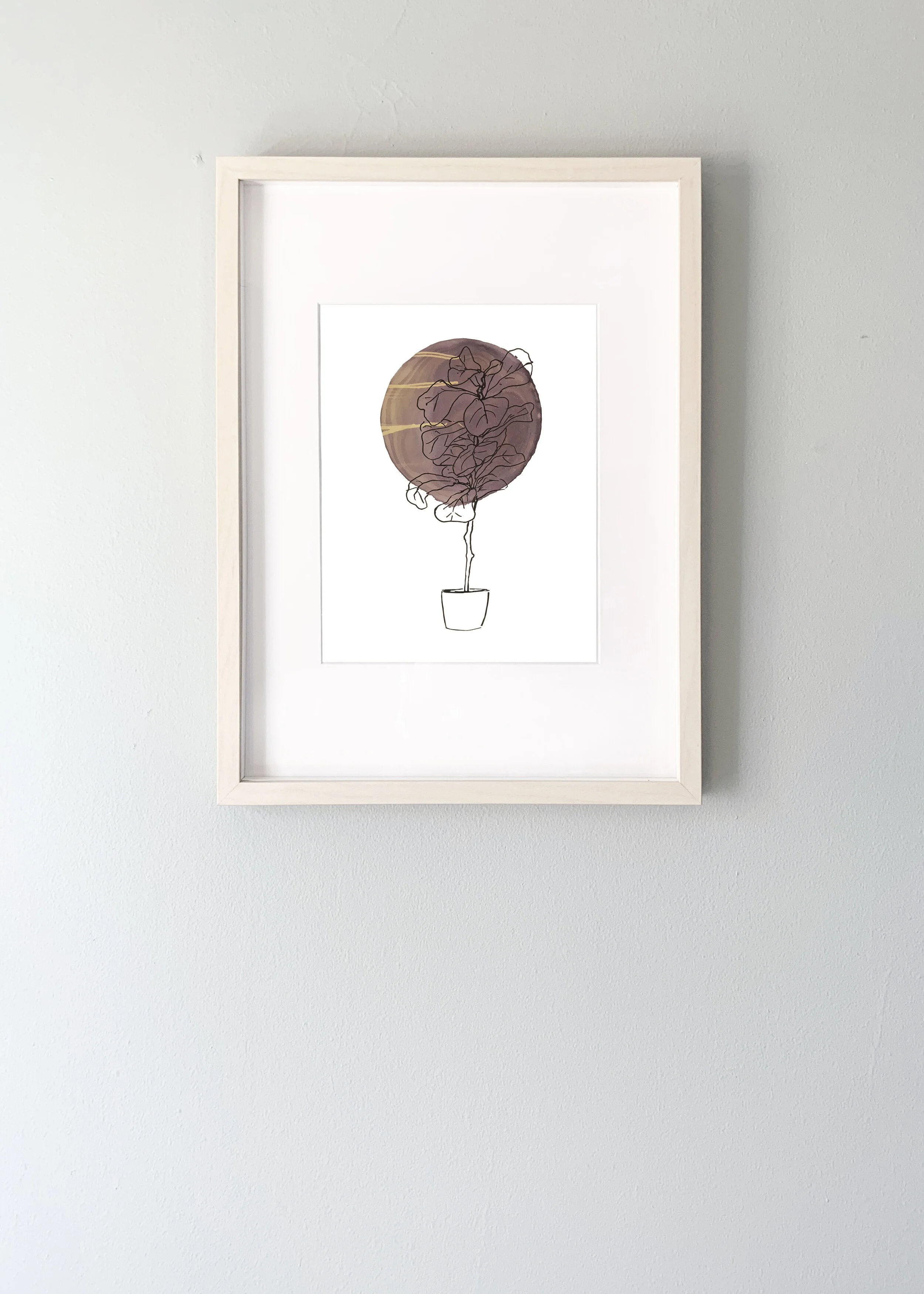 Line drawing of a fiddle leaf fig plant over a circle of ink