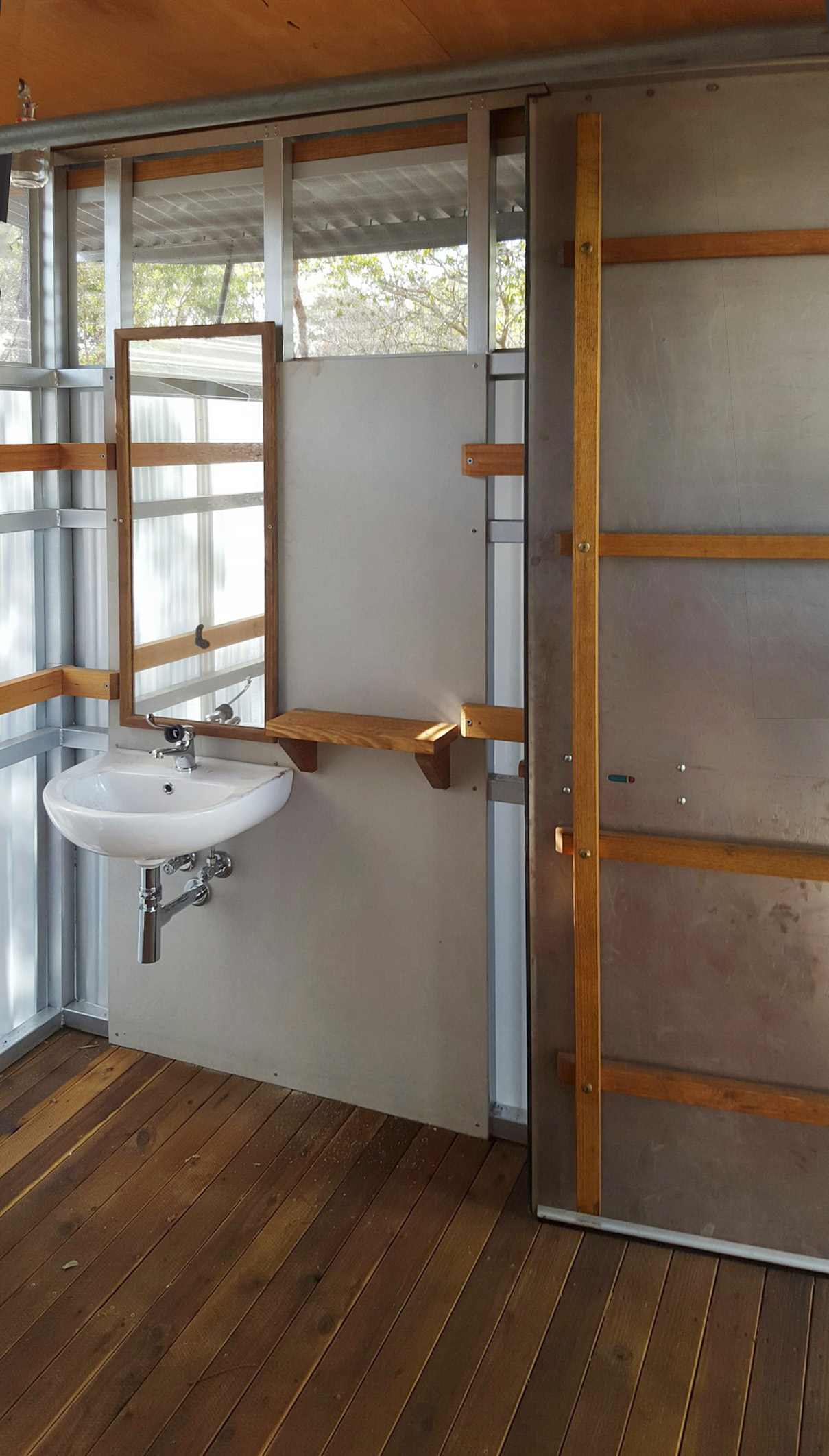 Back to Gallery BORDER STORE, KAKADU, NT the Bush or not-so-Bush Portable Bathroom With no site too hard to reach, even on the edge of Arnhem Land in this case, the trop_pod Portable Bathroom can be nestled into any needy locale. It comes a range of floor plans, that can be adapted and refined to suit your needs. Current models include: bathrooms with and without baths, access bathrooms, and with laundry or store add-ons. Built from products made to last, and with low environmental impact, trop_pod Portable Bathrooms will ‘age gracefully’, and with enduring character They come complete with bespoke furnishings that include fretwork ceilings, single skin raw steel plate doors, fine joinery and custom light fittings… In fact right down to bespoke paper holders and towel ‘trees’. Why shouldn’t the Bush (or not-so-Bush) get ‘design’!