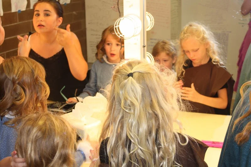 In make-up, you could help students find just the right bling for our performances