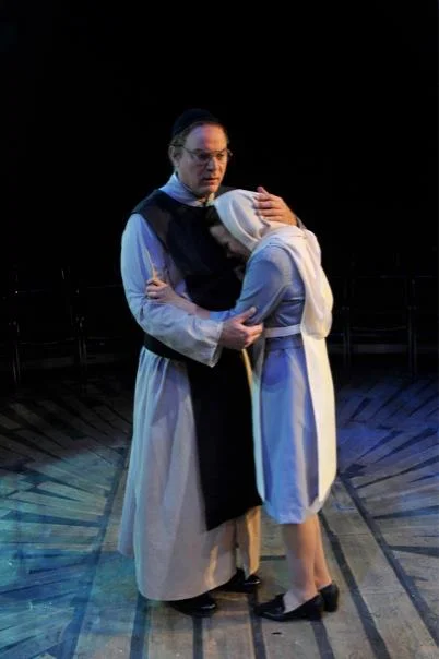 Duke Vincenzo (in disguise) comforts Isabella. From Measure for Measure , Colorado Shakespeare Festival, 2010. With Lenne Klingaman.