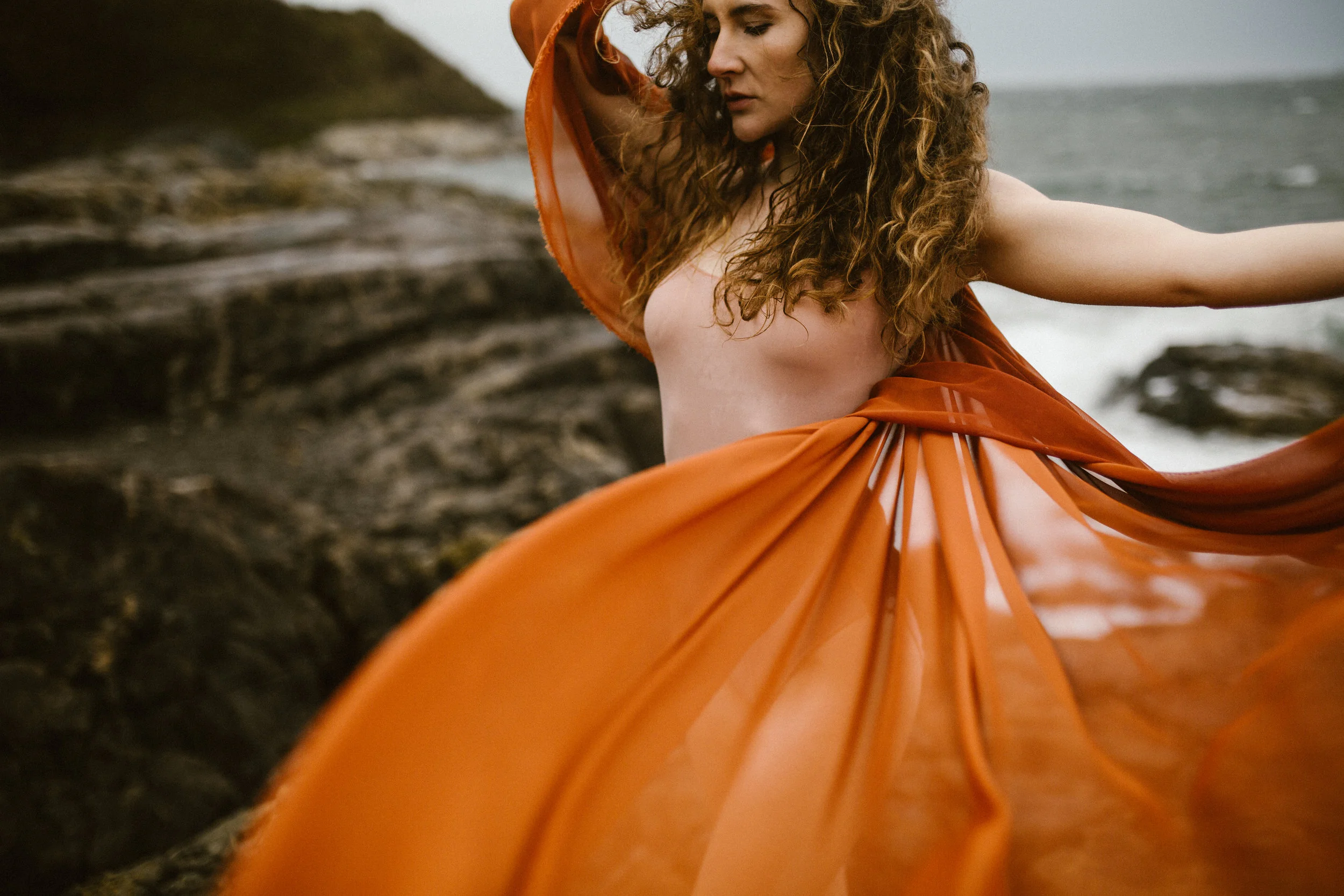 portrait of women in the wind on Dallas Road, Victoria boudoir photographer