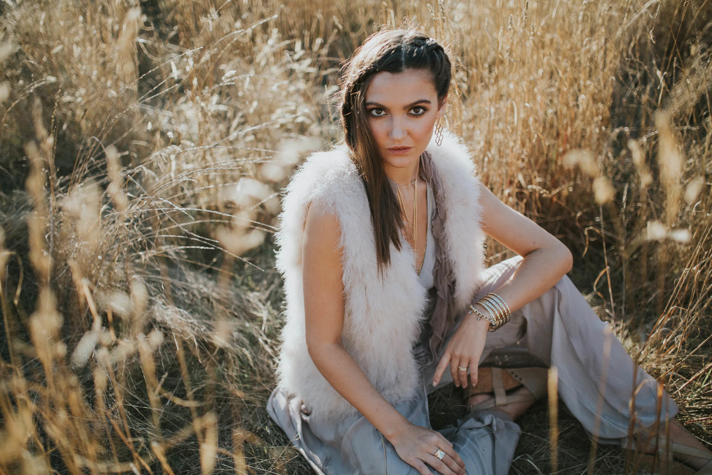 woman sits in golden field Victoria commercial photographer