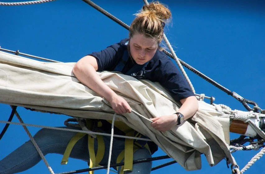 girl furling sail.jpg