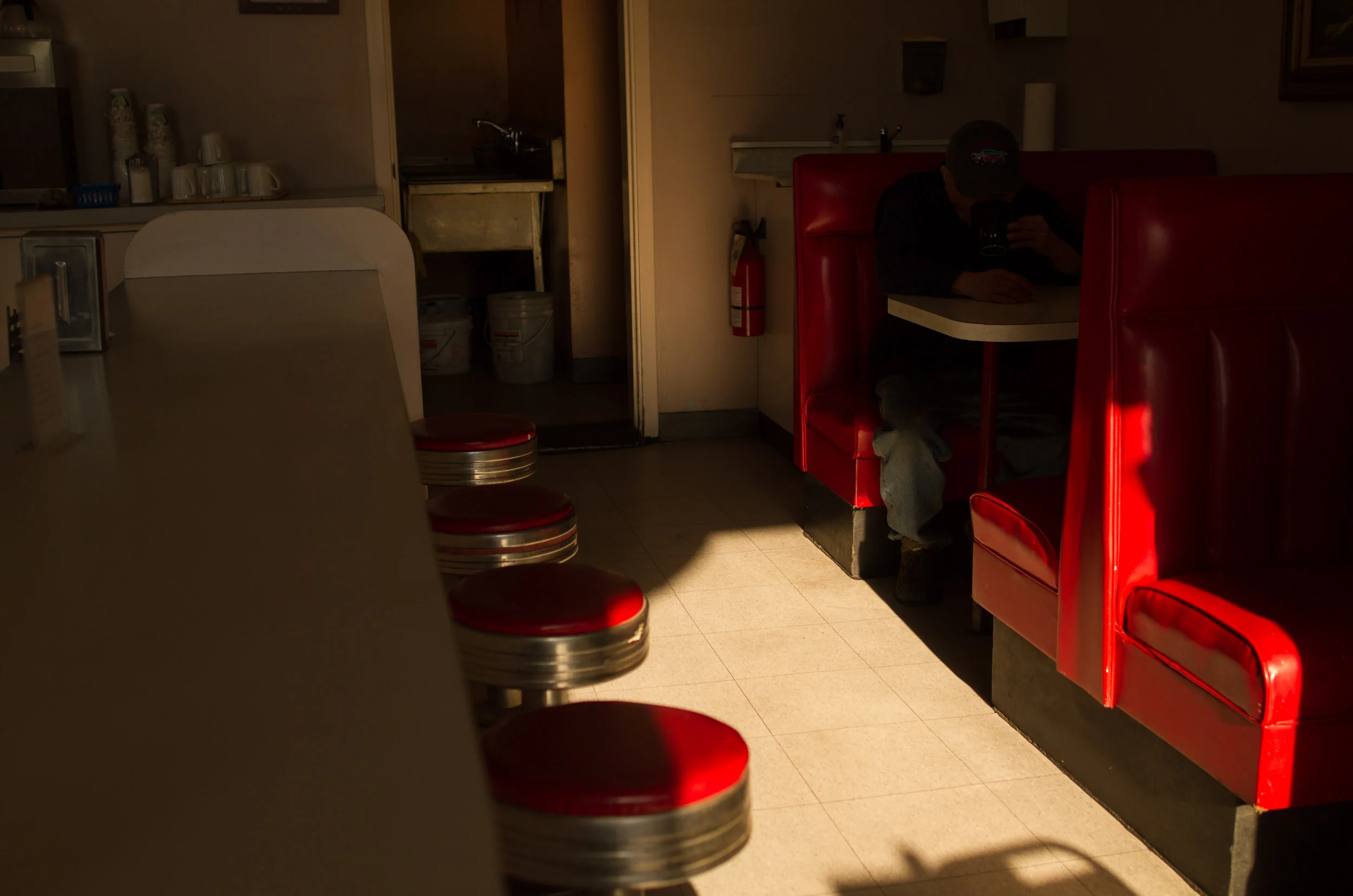 Coffee shop owner. Mitchell Island, Canada. 2014