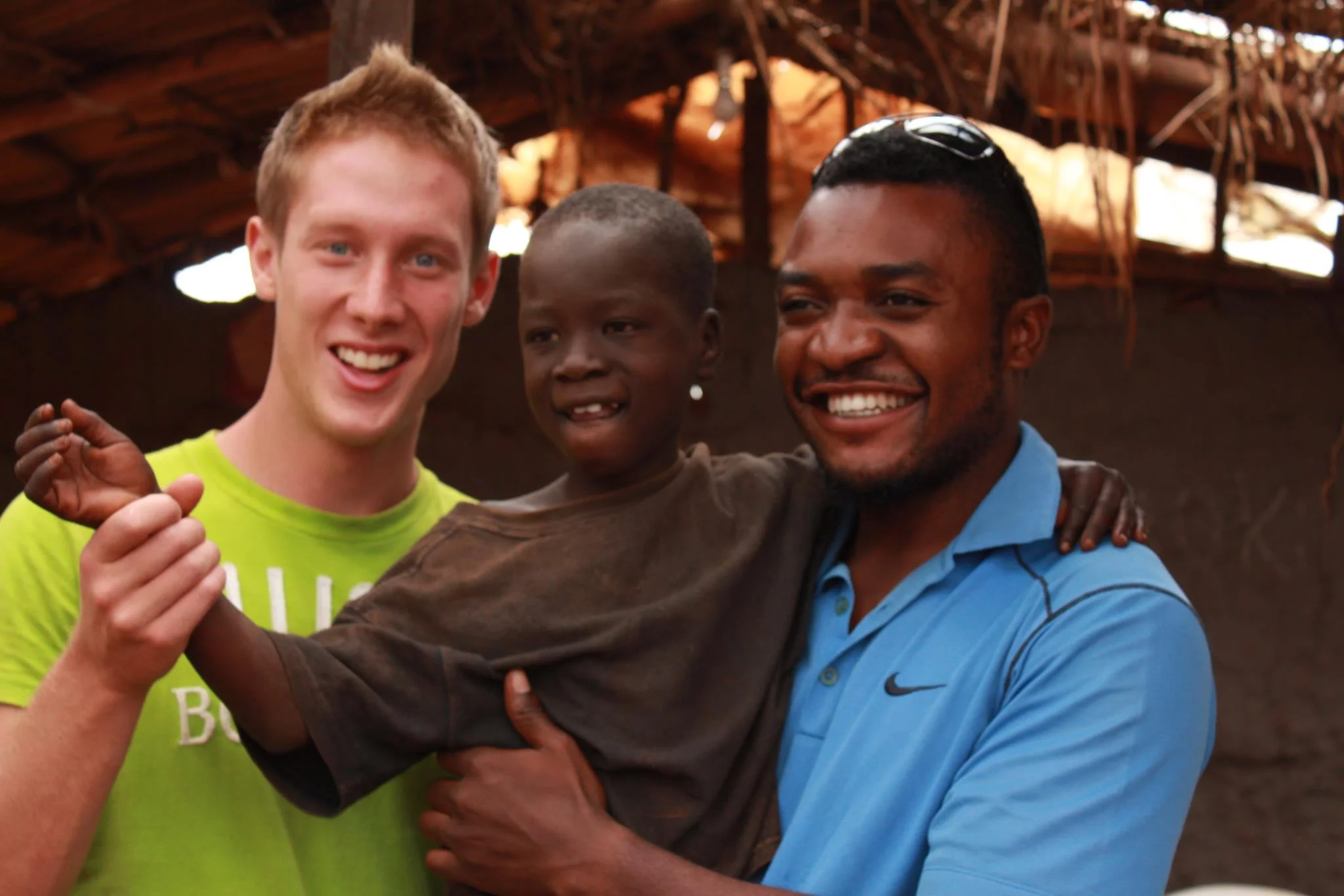 First picture taken with Emma in the slum of MaseseFrom left to right: Robbie, Emma, Raoul