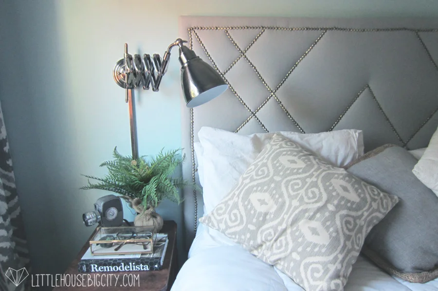 DIY tutorial for building a West Elm knock-off upholstered headboard with decorative nailhead trim