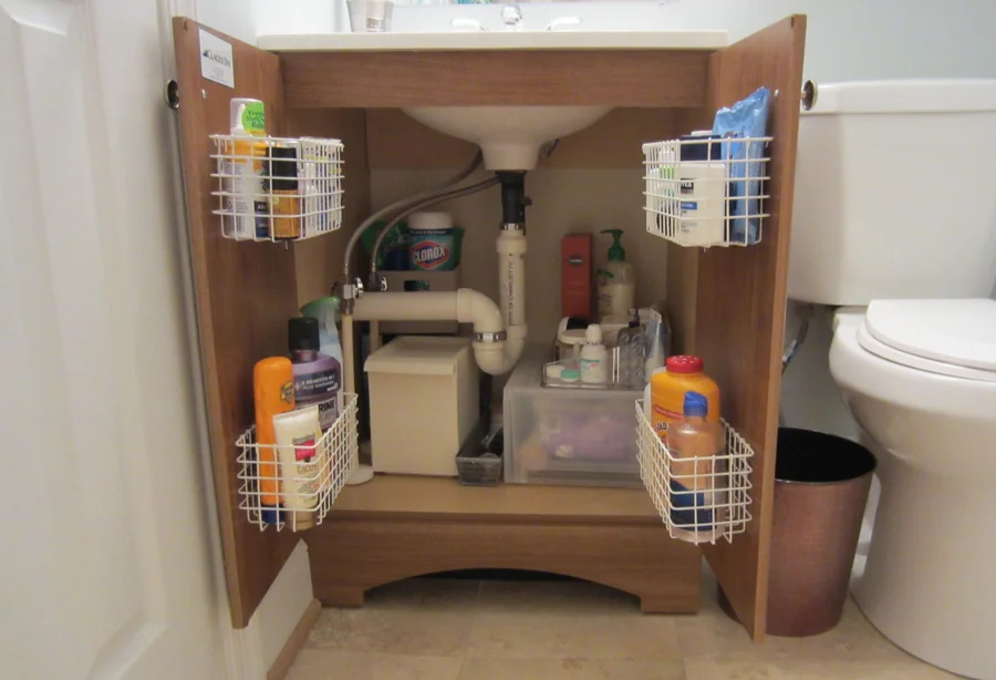 Compartments and baskets make all the difference under a small sink!