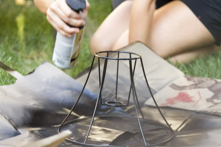 Step 2: Spray the lamp shade with two light coats of Rustoleum spray paint. 