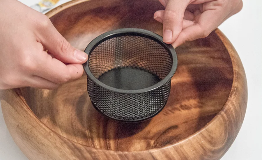Step 4: Attach paper clip cup to the center of the wooden bowl using superglue