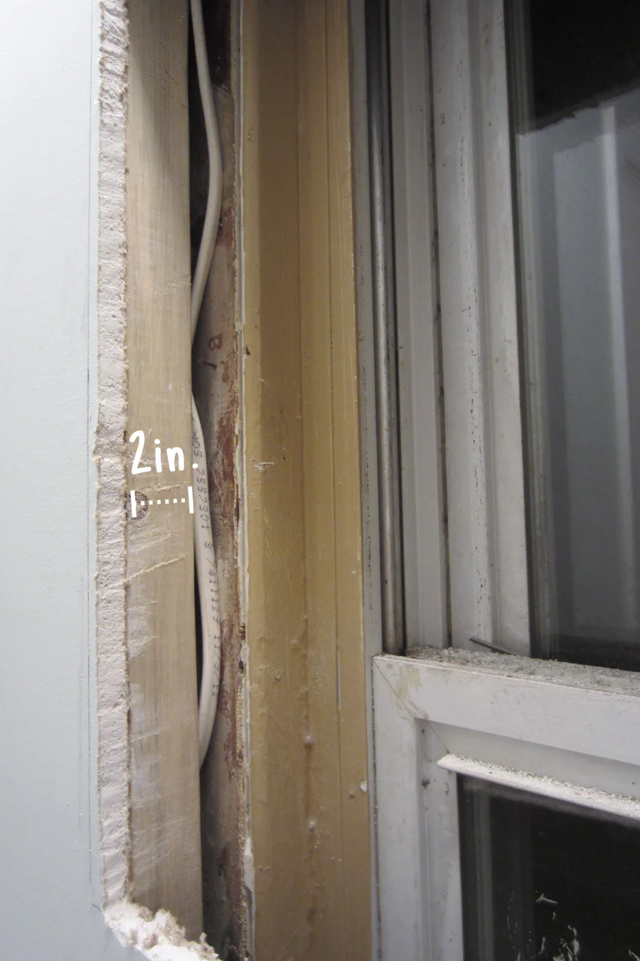The 2x4 was rotated to accommodate the window that was in the way of the stud