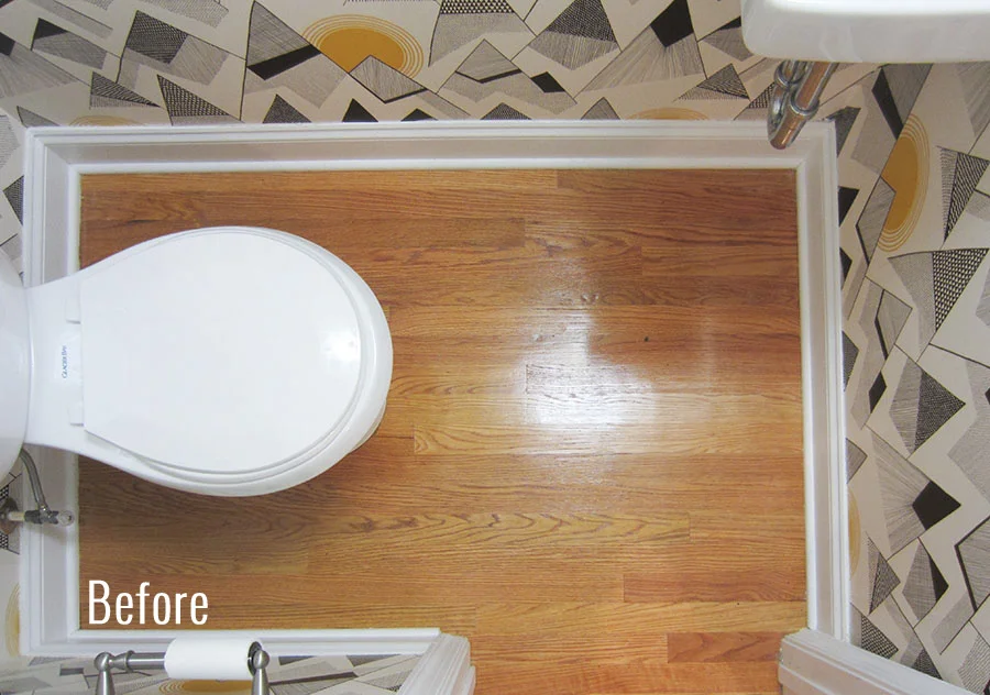 The powder room with natural oak floors