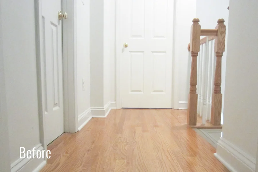 The hallway with natural oak floors