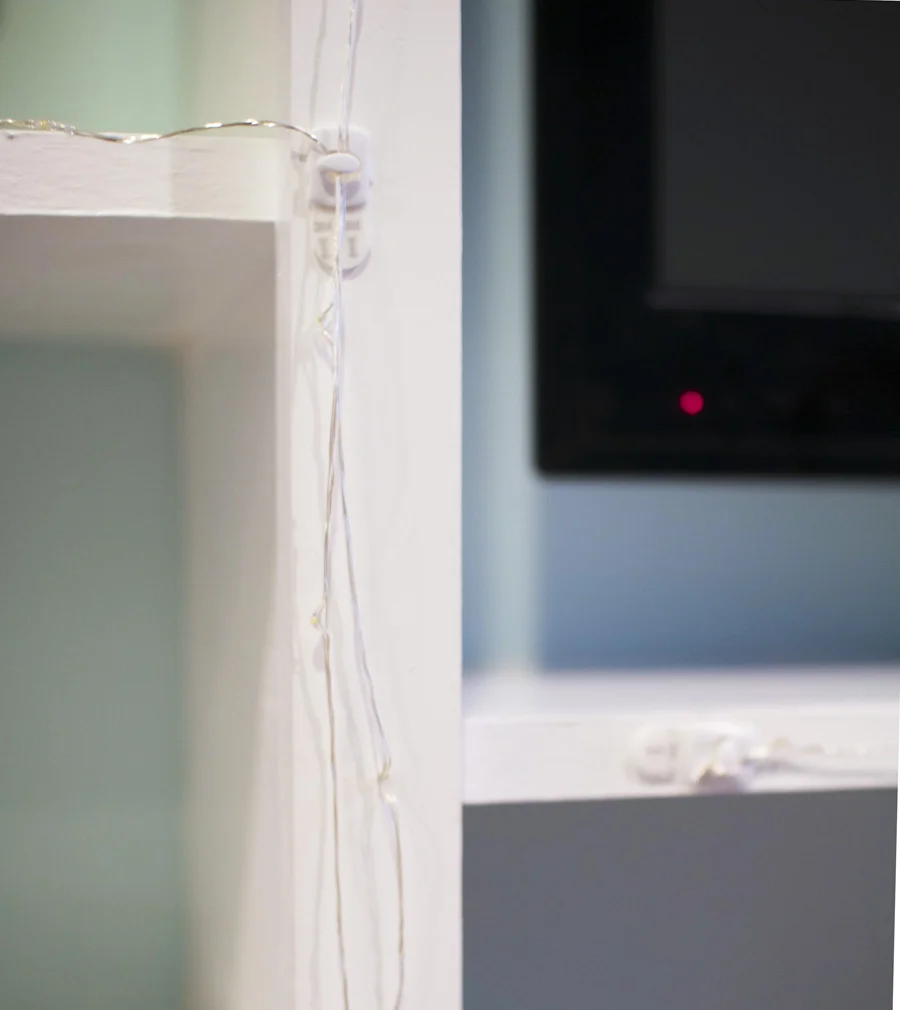 3M Command hooks save the day! Their decorator clips are perfect for stringing lights. 