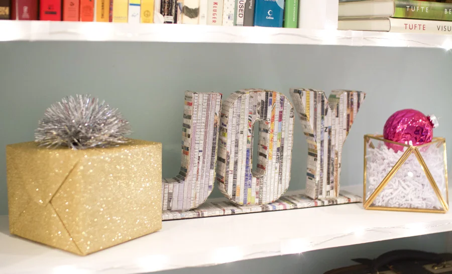 Fake presents, fake snow and ornaments make for a cute Christmassy vignette