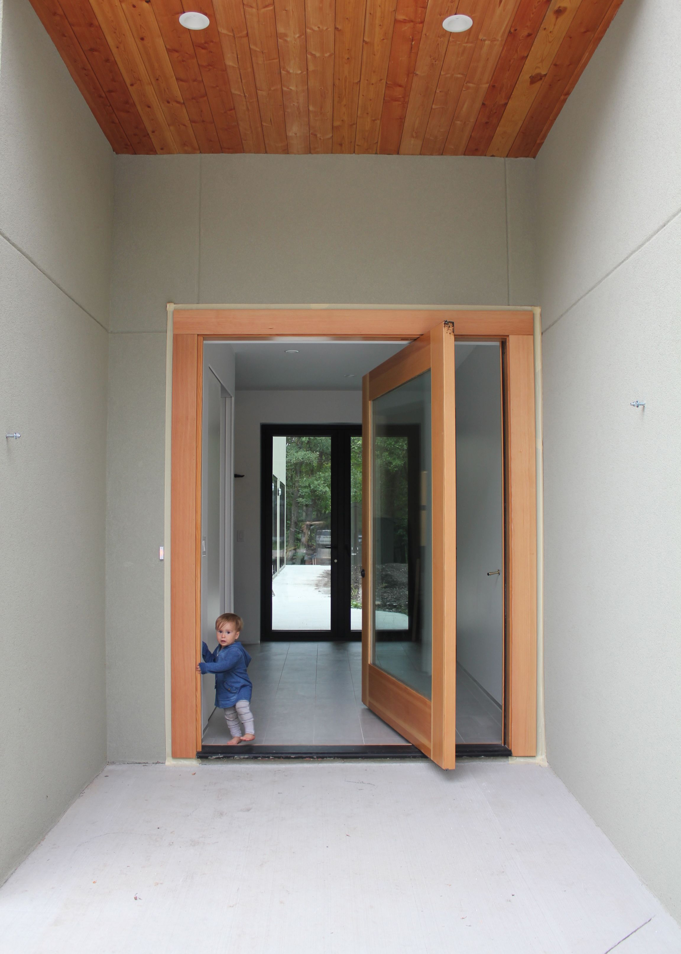  7’-0” solid oak pivot entrance Door    