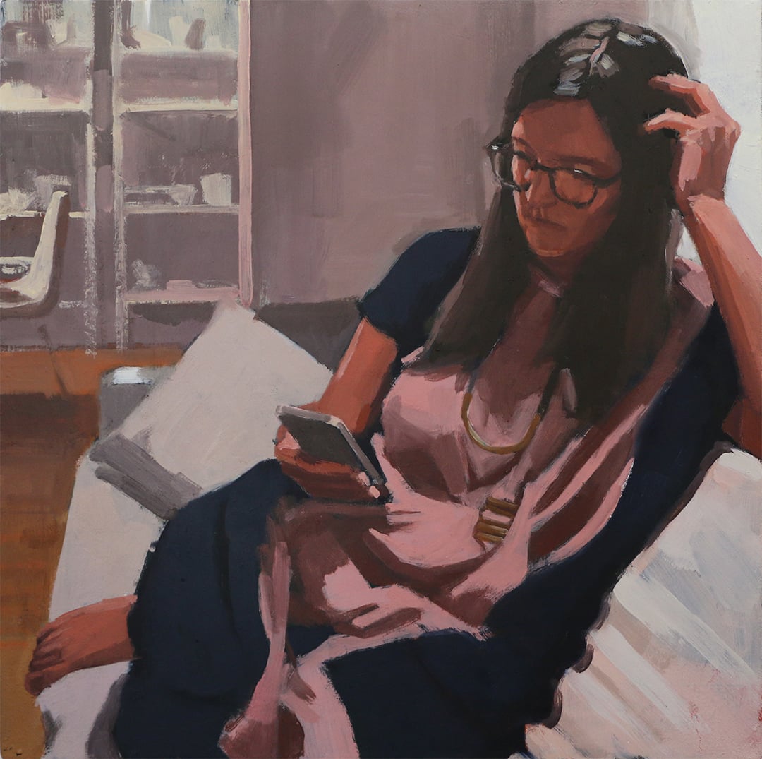 Sam checking her phone
