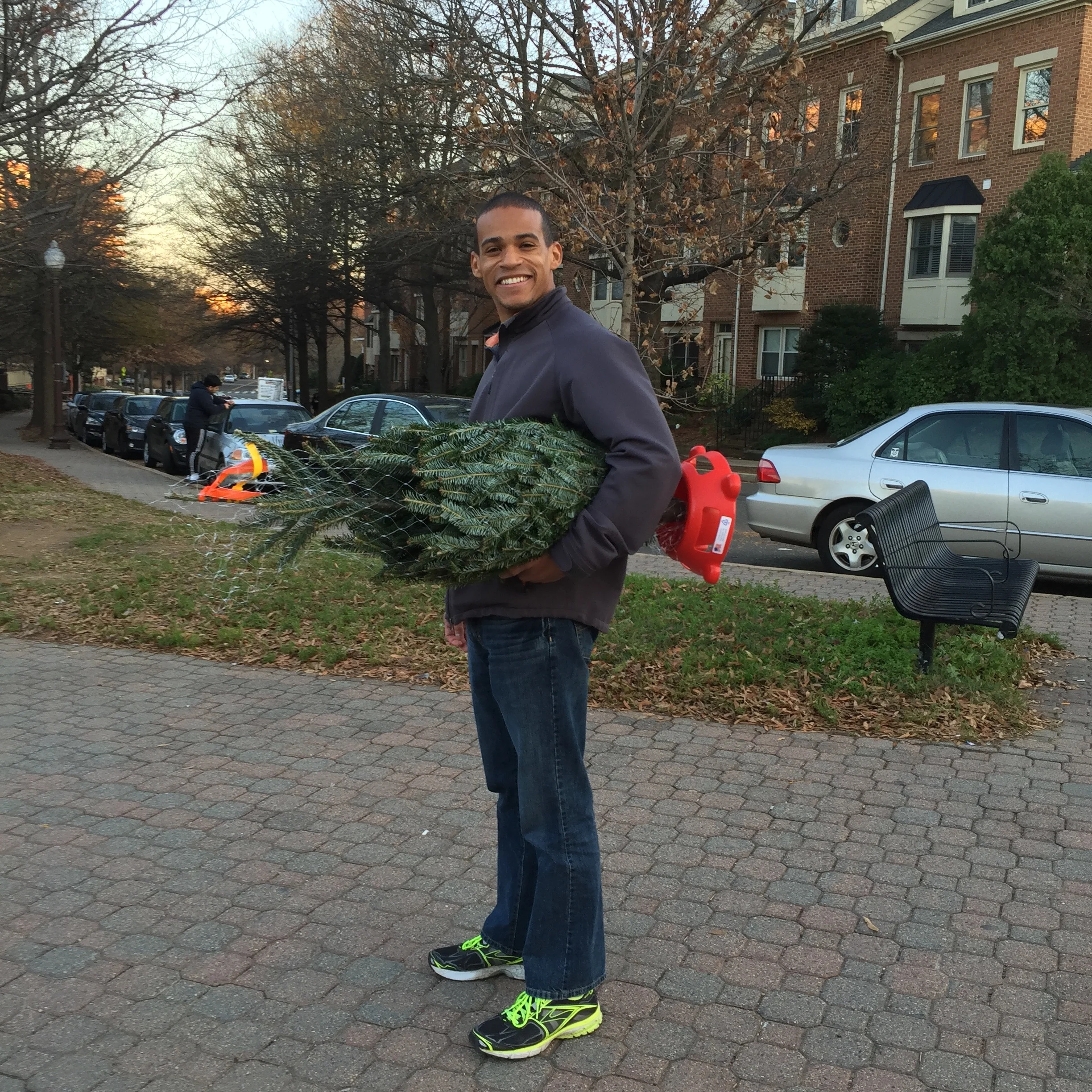 Walking home from Whole Foods with our first tree