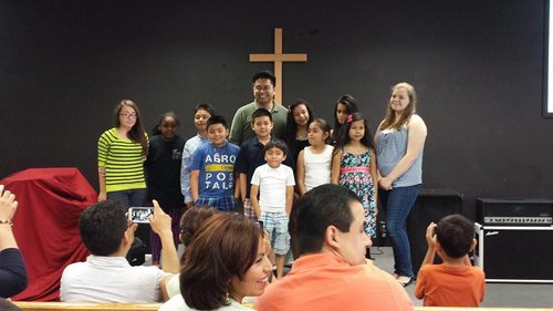 Pastor Aaron Sucaldito with the of the Academy students