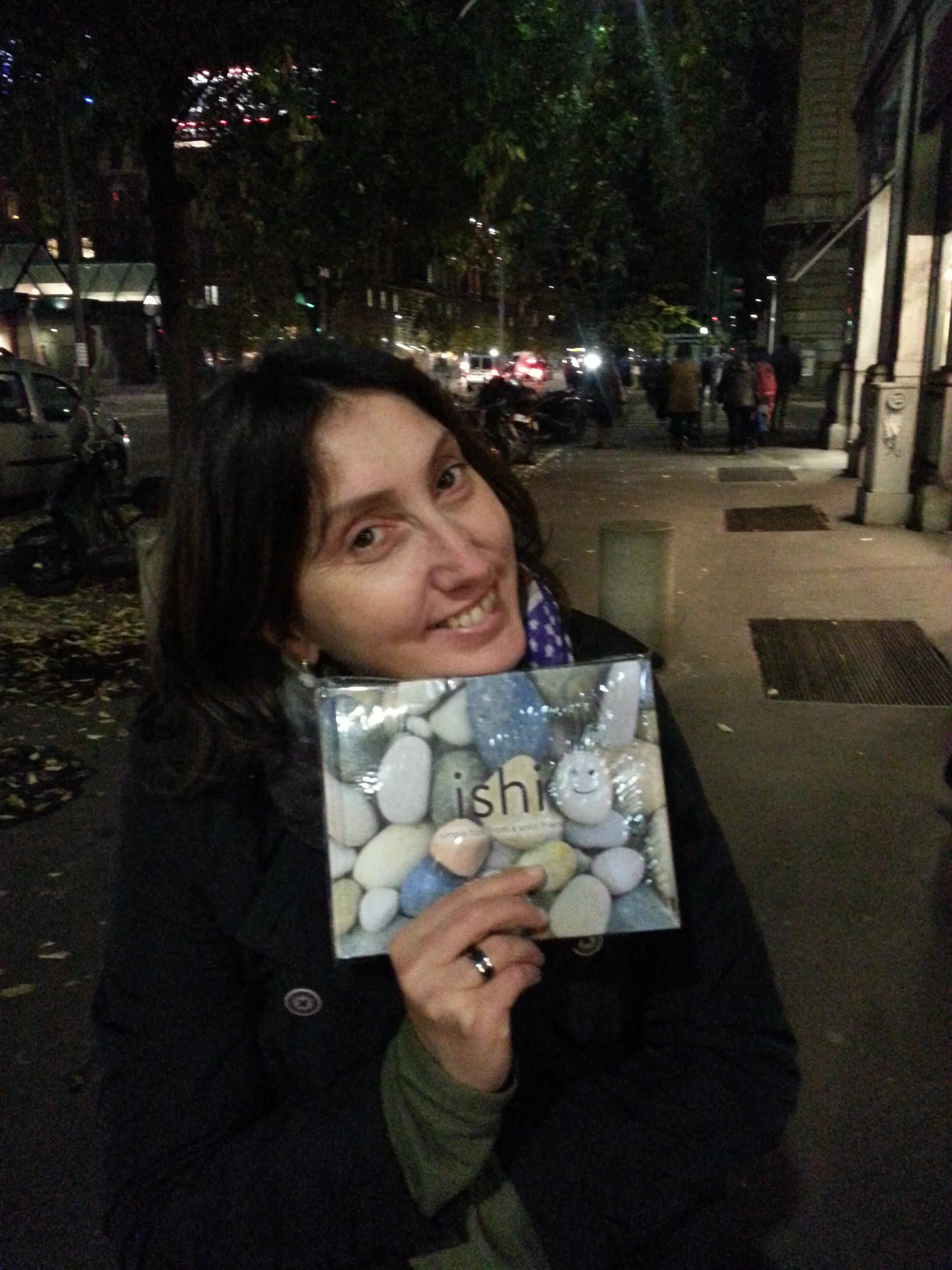 Letizia smiles with the ISHI book in Italy!