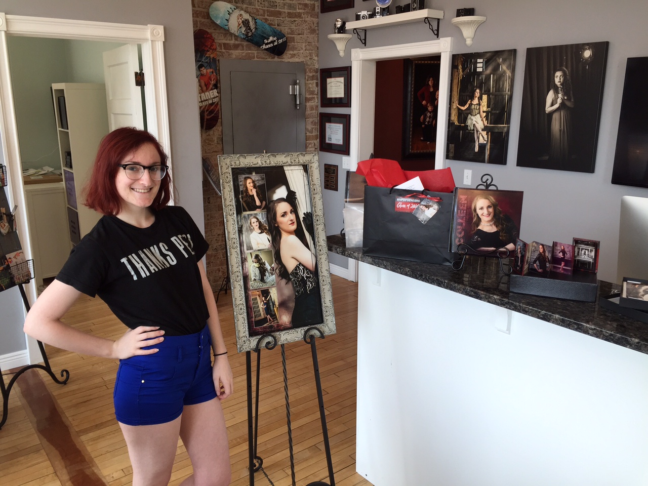 Colleen, our Senior Model from Stillwater, grabbing her bag full of goodies - her album, mini-accordion books, custom-framed and designed wall art collage, prints and so much more!