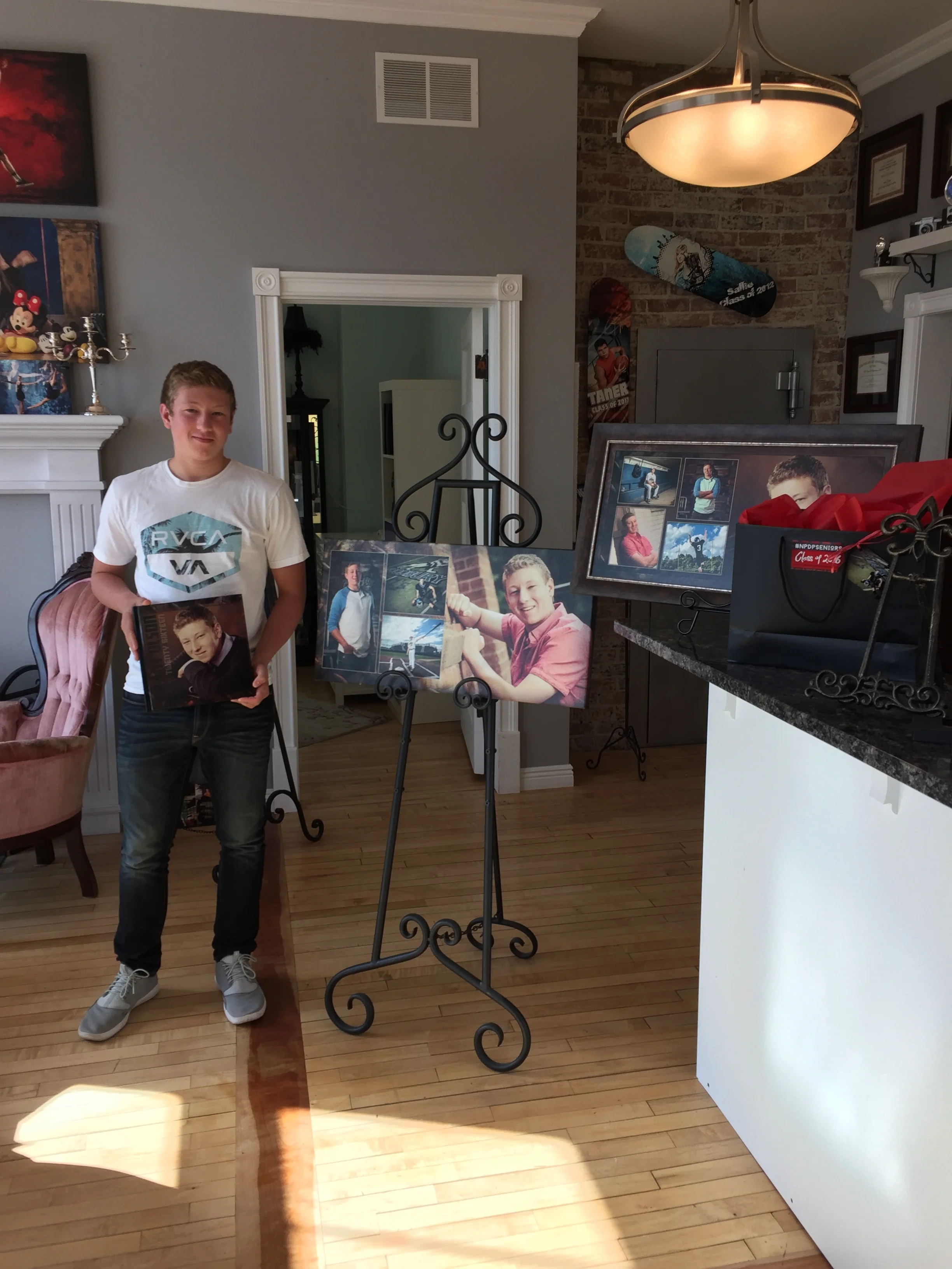 Woodbury Senior, Grant picking up all his images which were displayed in the lobby.