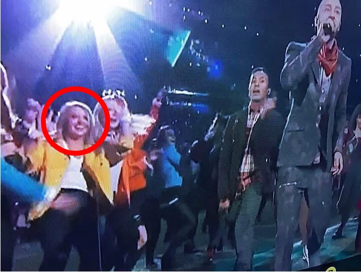 Gabbie, in yellow, just steps away from half time superstar Justin Timberlake.