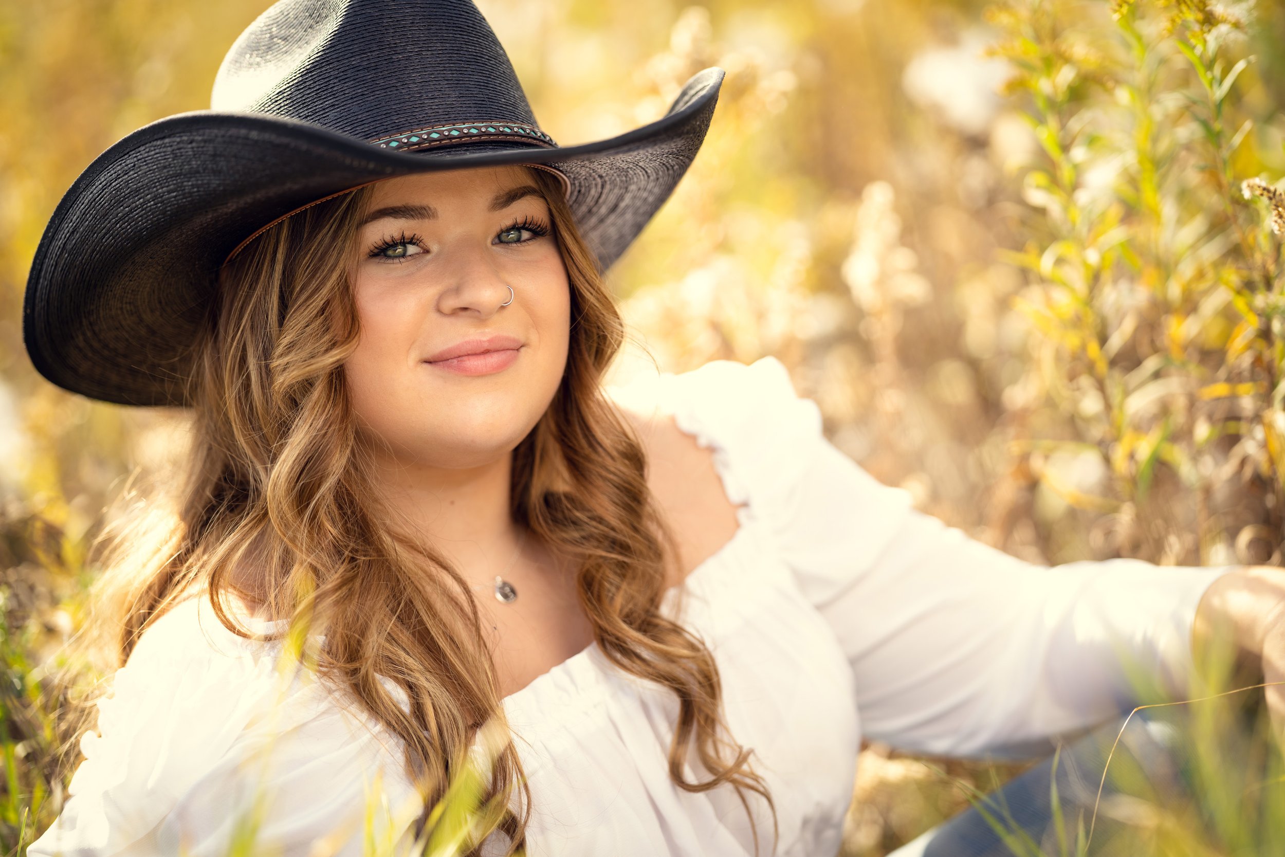 Country girl in field senior girl