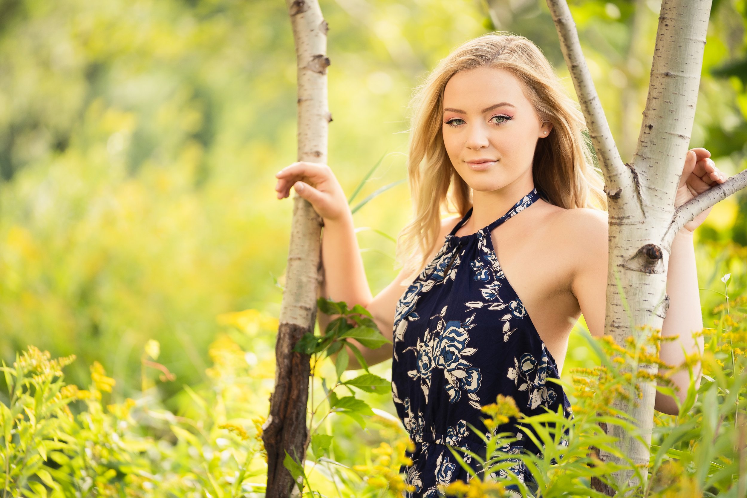 Senior girl outdoors in tree