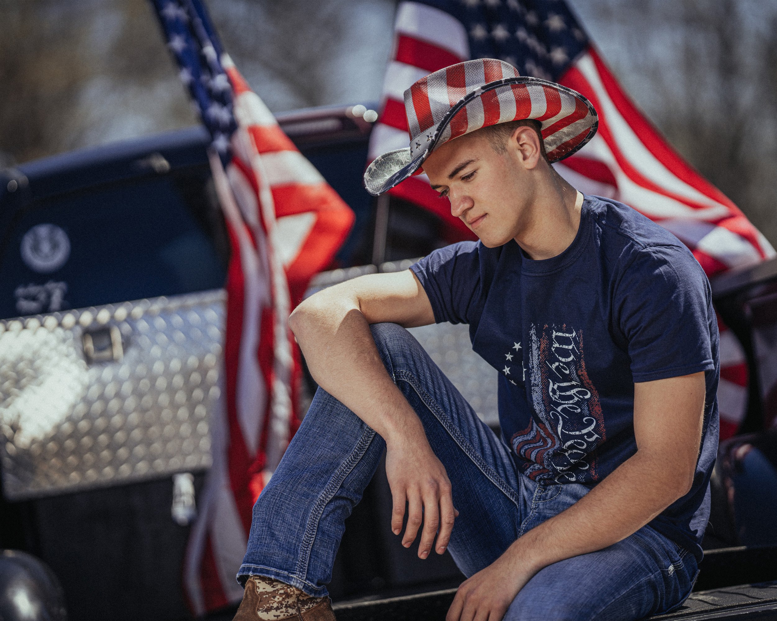 Country boy in America apparel with truck