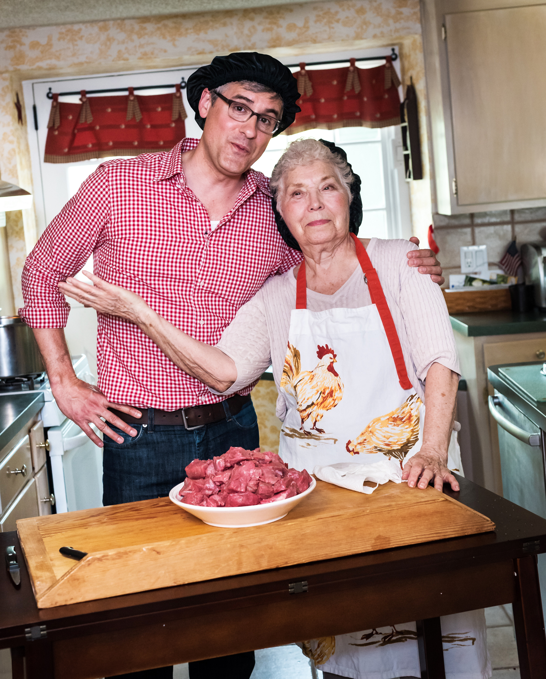  Host Mo Rocca helps prepare the kitchen and ingredients for today's stew and cherries, as seen on Cooking Channel's My Grandmother's Ravioli, Season 4. 