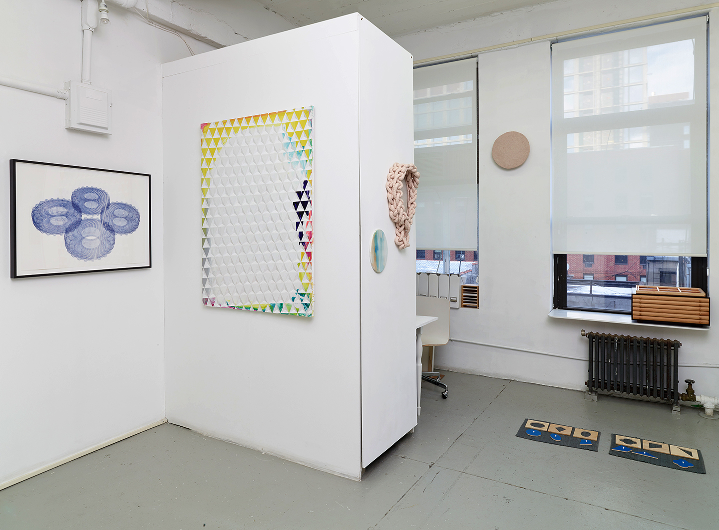 Installation view of works included in the group exhibition 'Geometric Cabinet' showing works in various mediums