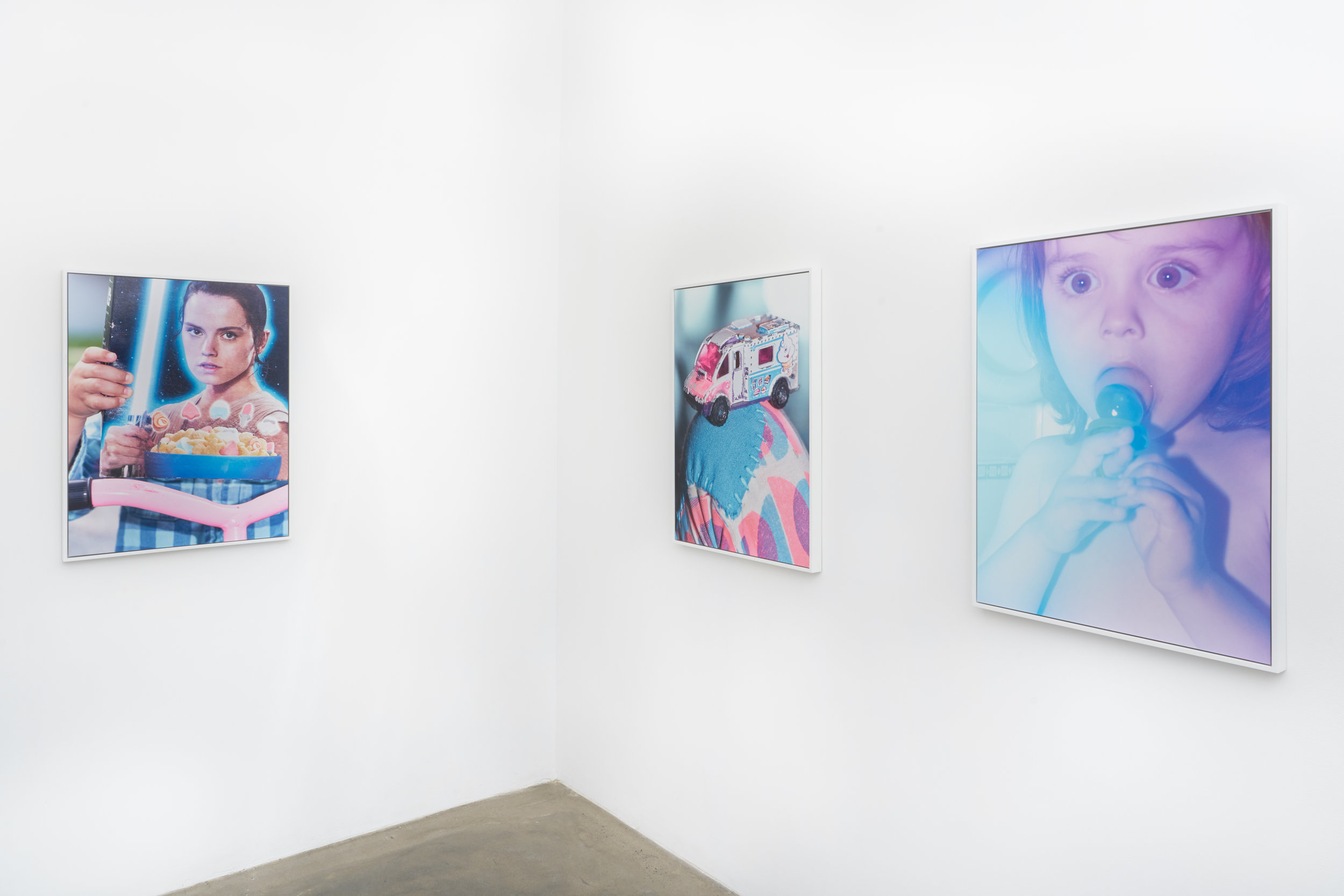 Installation view of framed photographs in Scott Alario's solo exhibition 'Soft Landing'