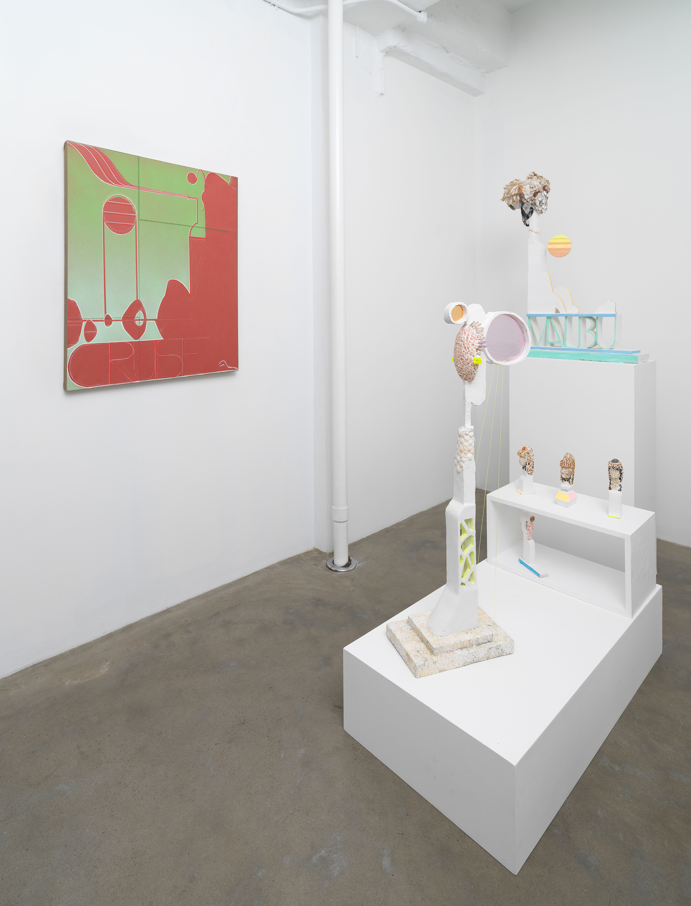 Installation view of Michael Wetzel 'Bu,' showing sculptures made with found shell components and a work made with painted paper attached to stretched linen