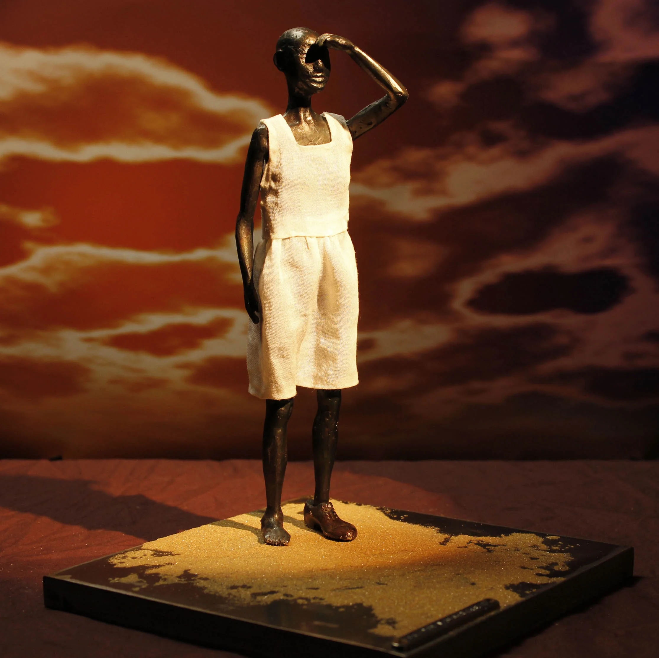 Her Property (full-length portrait model) 7.8"x7,8"x9" steel, cloth, sand