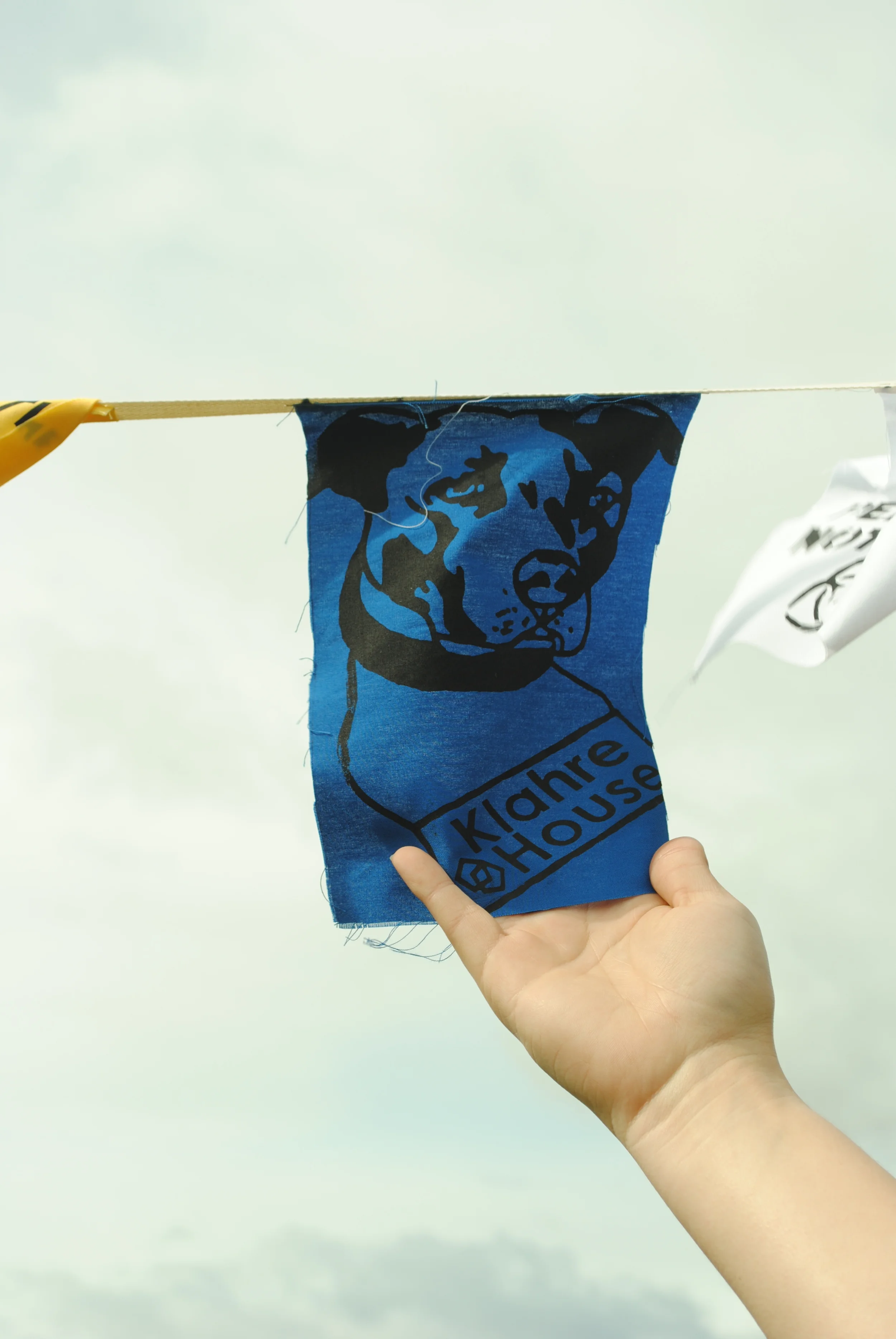 Screenprinted Peace Flags with the Klahre House