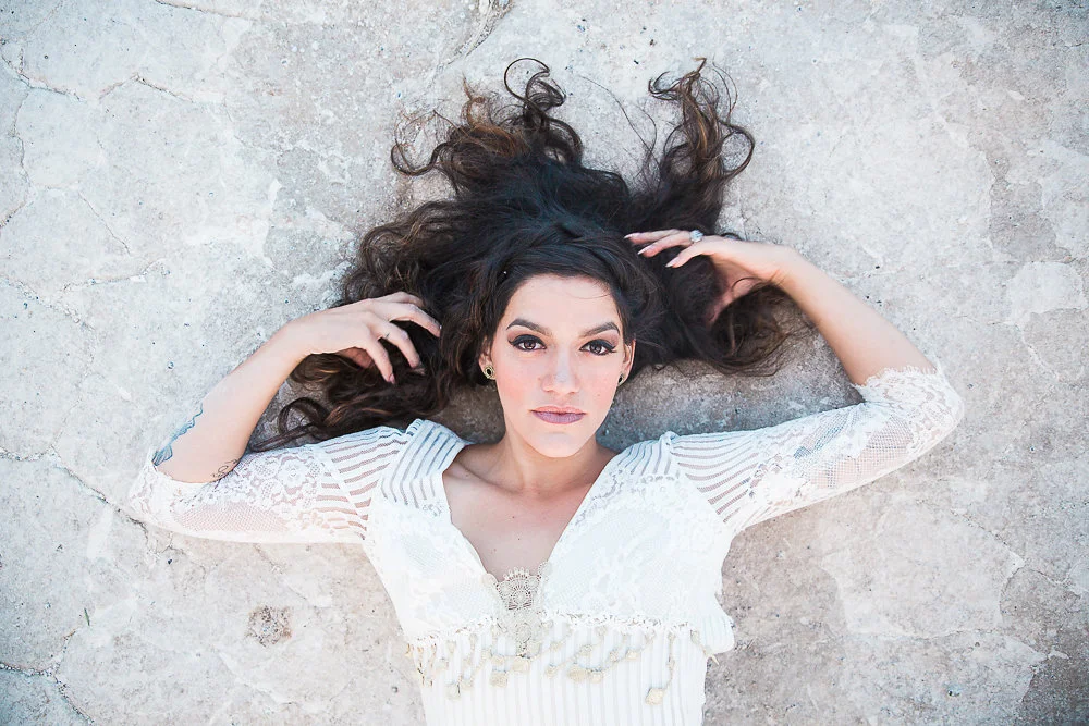 I just have to say how much I love this model, Terasina. There is something completely captivating and unique about her features, and the way she carries herself. Plus she has tattoos which you just don't see enough of in bridal photoshoots...