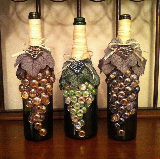 https://images.squarespace-cdn.com/content/v1/52ec4375e4b0aed20621cc8f/1393873232502-FKSWZURW5F6035UPTAJG/wine+bottle+grape+glass+beads.jpg