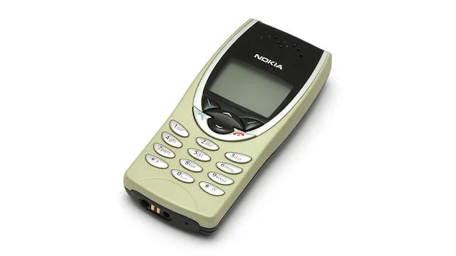 1200px-Nokia_8210_in_light_cover.jpg