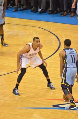 Thabo Sefolosha guards Memphis point guard Mike Conley in Game 5 of the Thunder-Grizzlies 1st Round playoff series. Photo By Torrey Purvey for InsideThunder.com