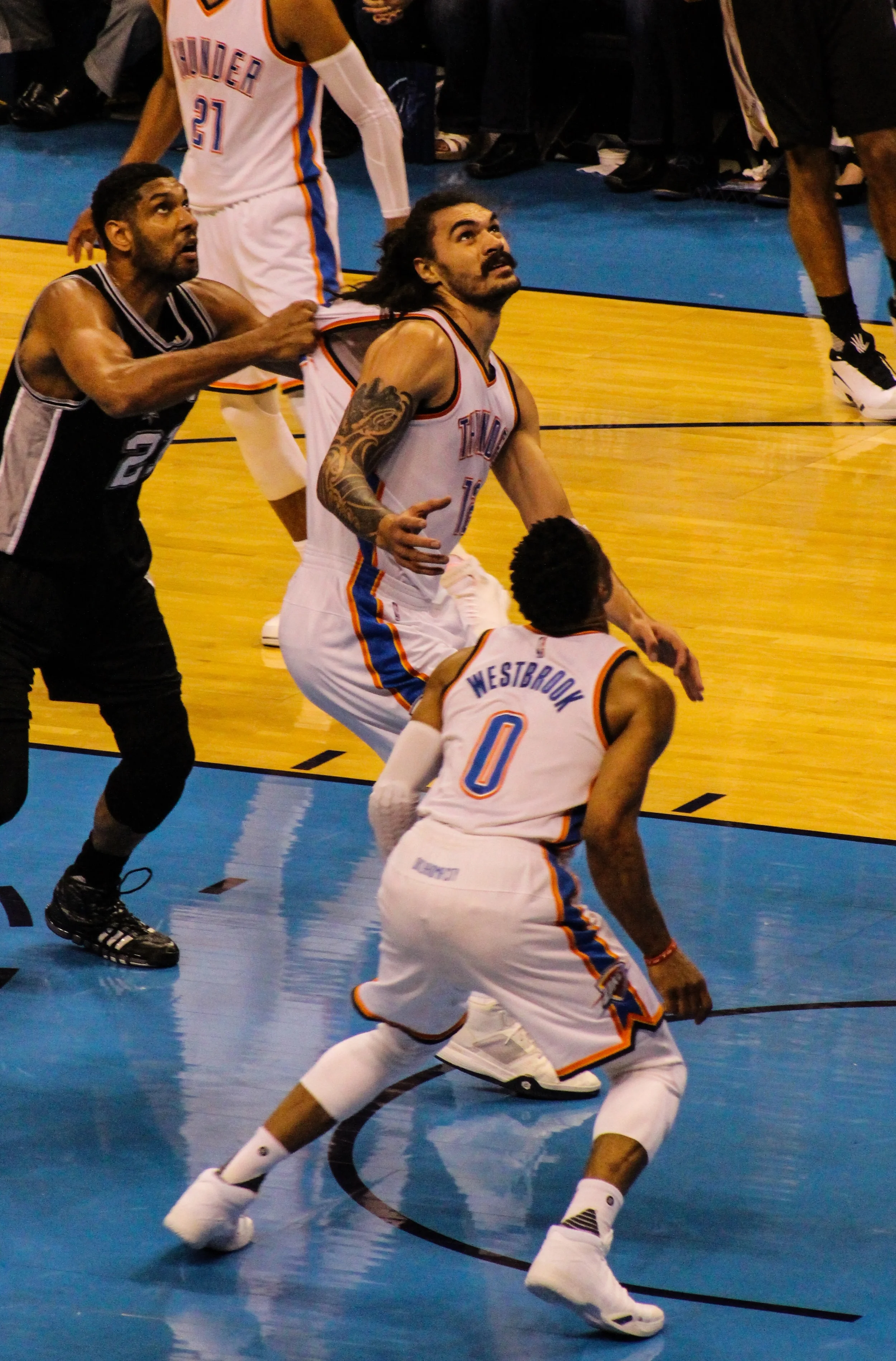 Thunder center Steven Adams has his jersey yanked by Spurs center Tim Duncan during Game 6 of the Western Conference Semi-Finals. (Photo By Sam Murch/InsideThunder.com)