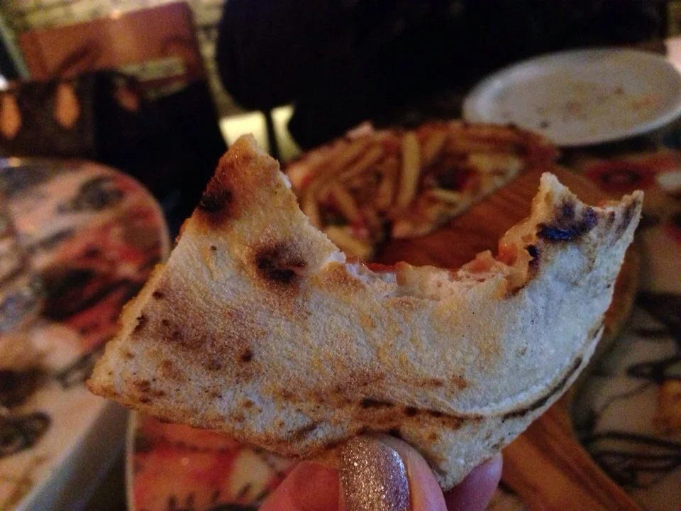 Crust - thin and chewy. Not burnt to a crisp edge or soggy centre like some other places!