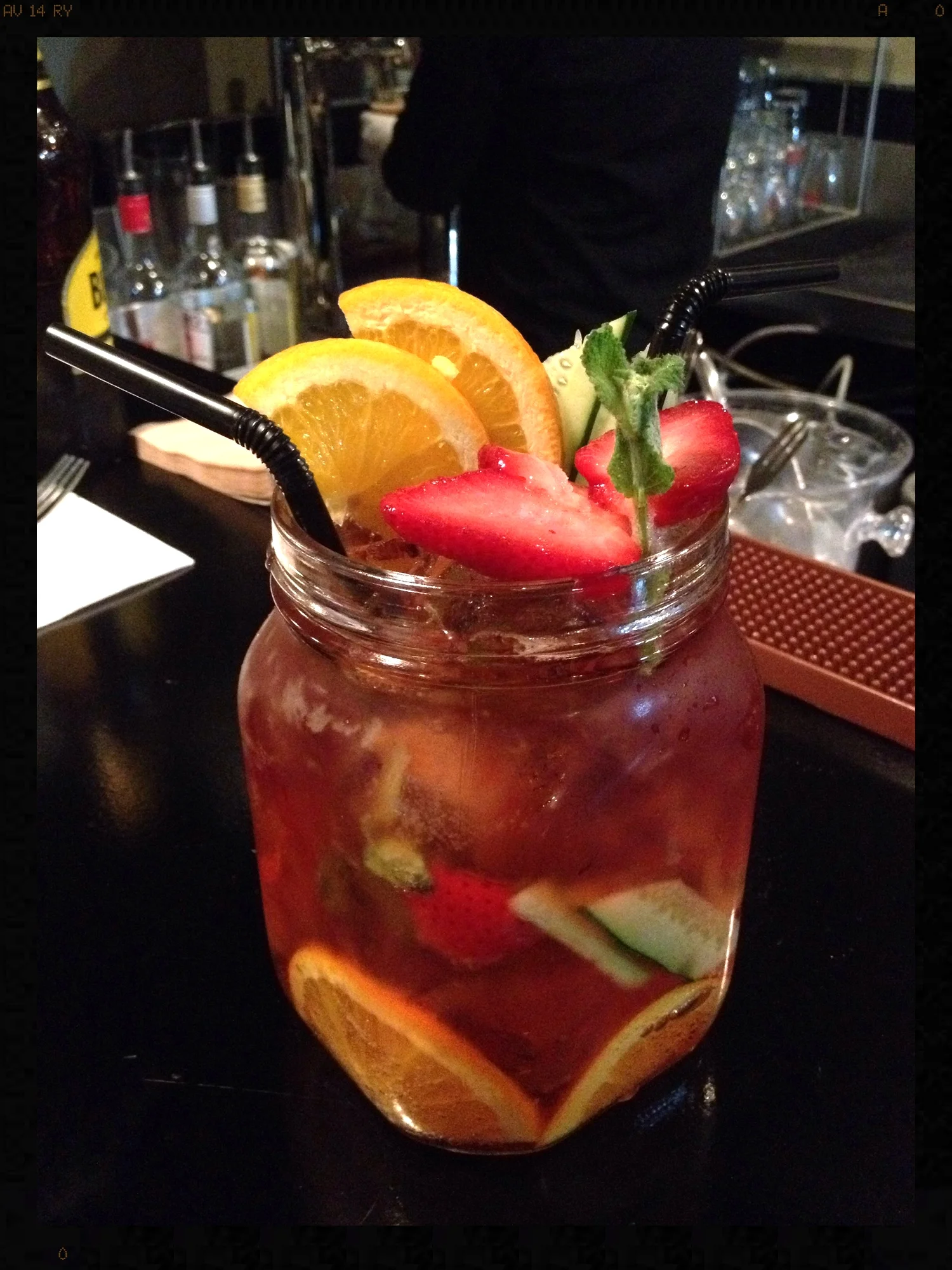 The Original Classic here. It is served in a huge Mason jar, and has 4 shots of Pimm's in it. I think this was 12 000W. Great and refreshing, made with tons of fresh fruit. I think they are litre sized Mason jars! Both of these drinks need two hands to pick up! Totally worth it!