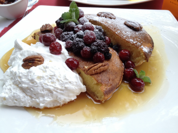 Tango du Chat Pancake: Meringe Pancake with Mascarpone Cream Cheese & Summer Berries. Not your typical American pancake. A lot thicker, fluffy with a base of maple syrup on the plate perfectly paired with fresh summer berries, nuts and a light and fluffy better than whipped cream sweet mascarpone cream cheese. Normally not one who loves pancakes, this dish was amazing!