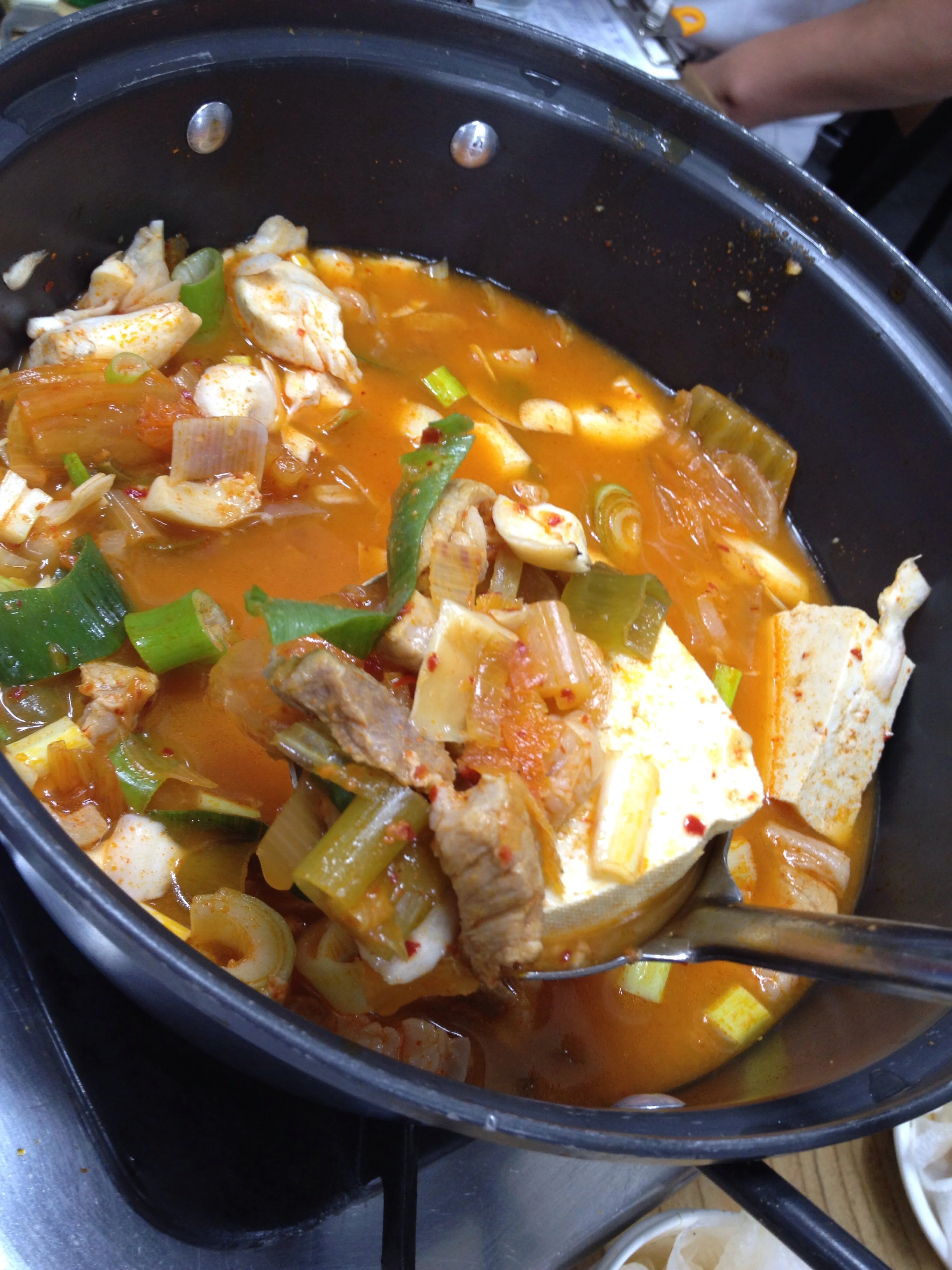 Reason #2 - Here, the stew is very generous with the ratio of meat to kimchi to soup! Kimchi jiggae is a classic Korean stew with a spicy soup base made with red chill pepper paste, kimchi, meat or tuna fish, tofu, onions and green onions. Delicious!